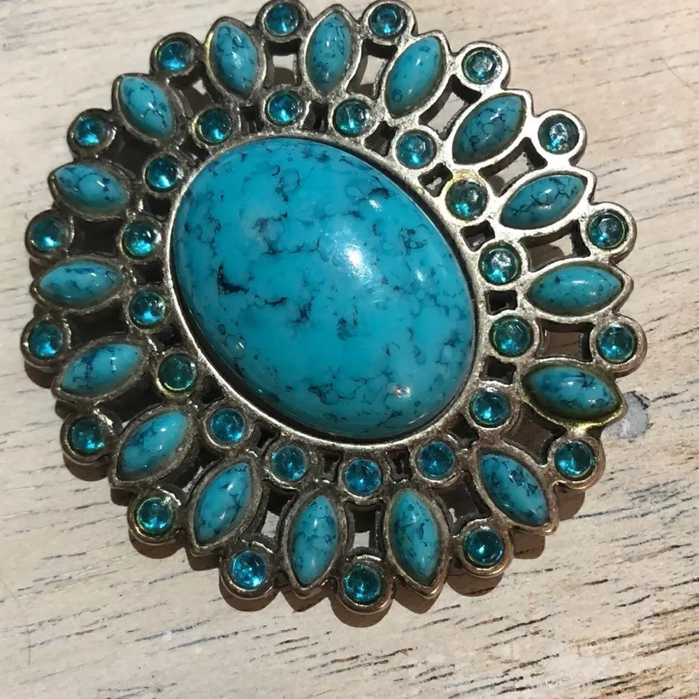 Turquoise faux stone large belt buckle.